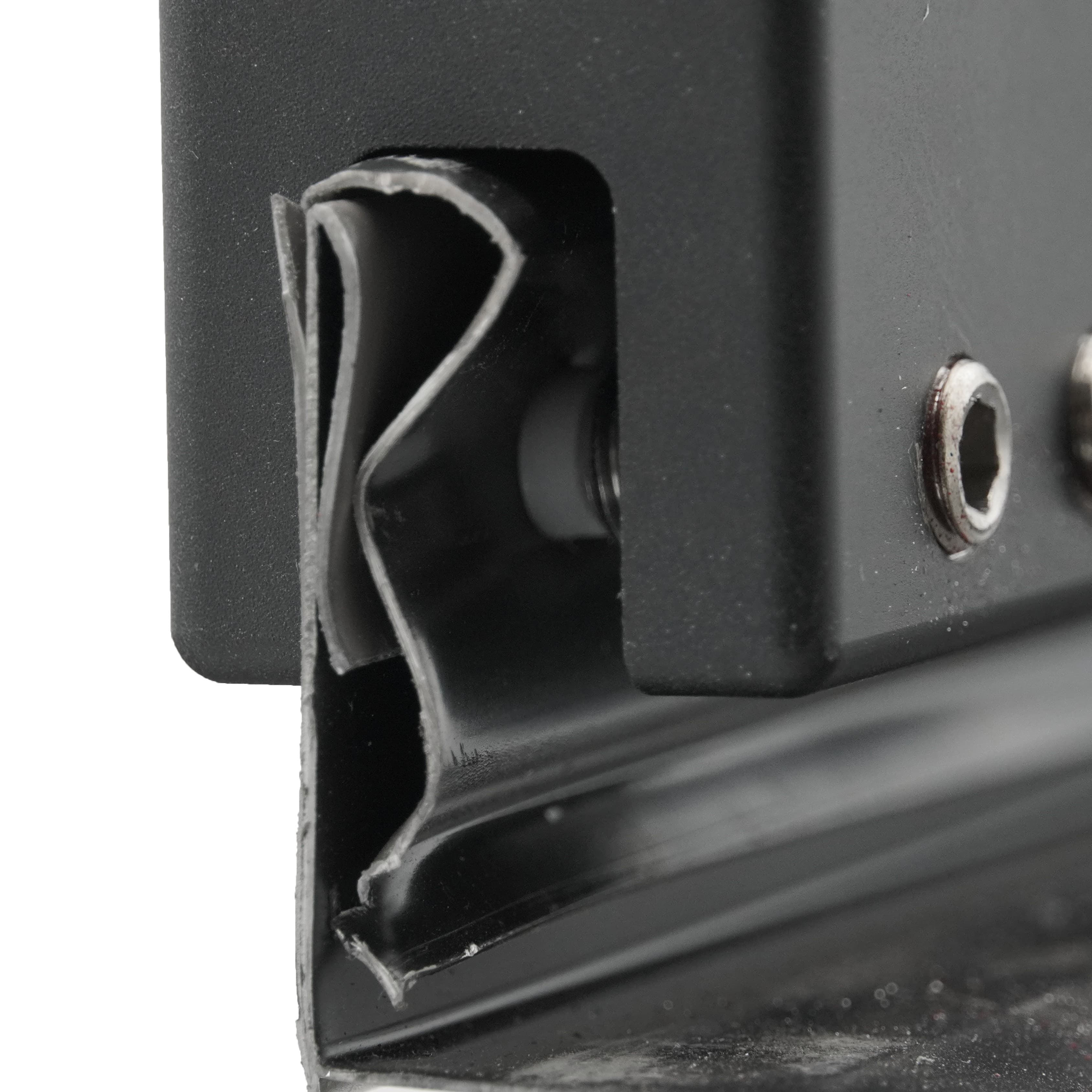Close-up of the ArcticAnchor seam clamp jaw gripping a 1.75 inch standing seam panel