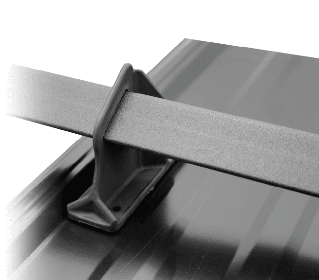 ArcticAnchor exposed fastener stand and strap installed on a metal roof panel
